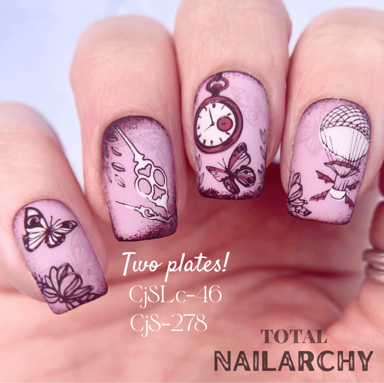 beautiful-manicure-with-destressed-style-nail-art-designs-of-butterflies-pocket-watch-and-hotair-balloon