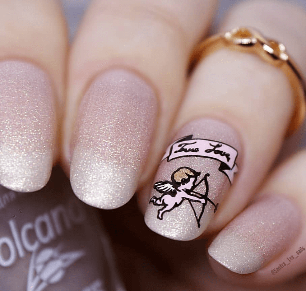 stunning-manicure-with-nail-art-designs-of-a-cupid-and-the-words-true-love
