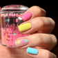 manicured-hand-holding-a-clear-jelly-stamper