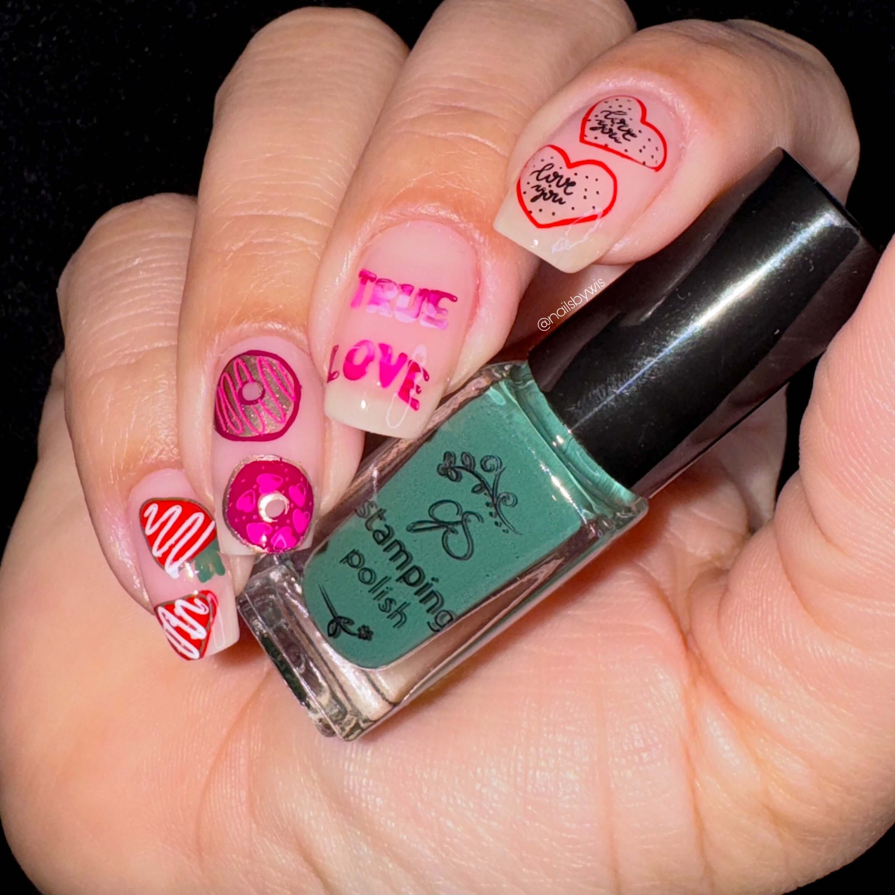 manicured-hand-holding-a-clear-jelly-stamper-polish-bottle