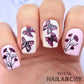 manicured-hand-with-stunning-nail-art-designs-of-butterflies-and-flowers