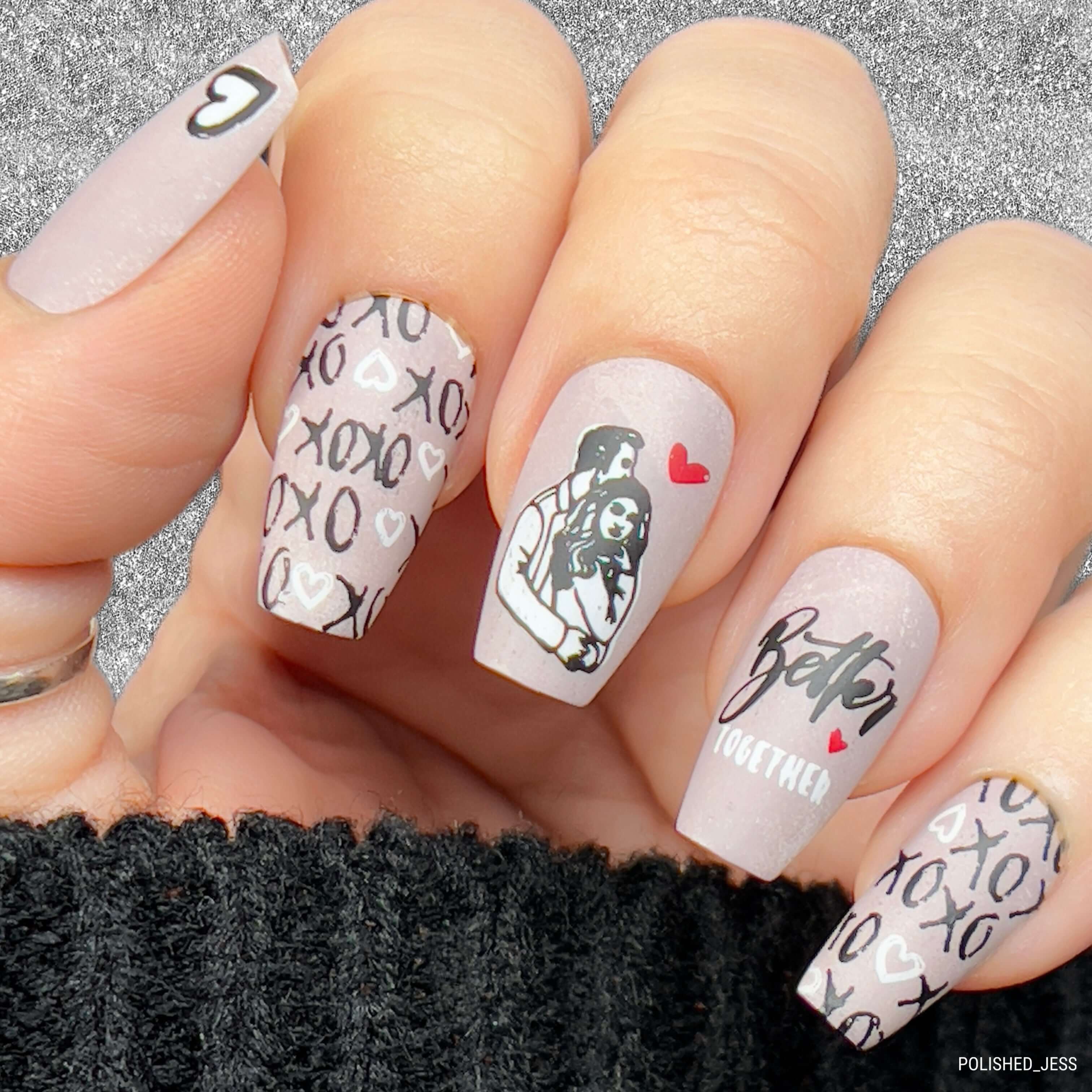 manicured-hand-with-stunning-nail-art-designs-of-a-couple-cuddling-xo's-and-words-better-together
