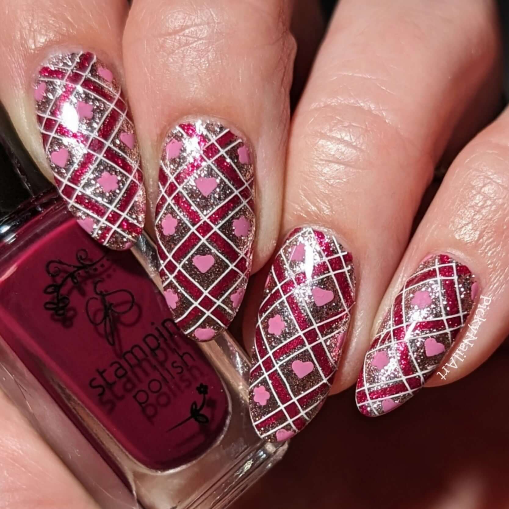 manicured-hand-with-stunning-full-coverage-checkered-heart-nail-art-pattern