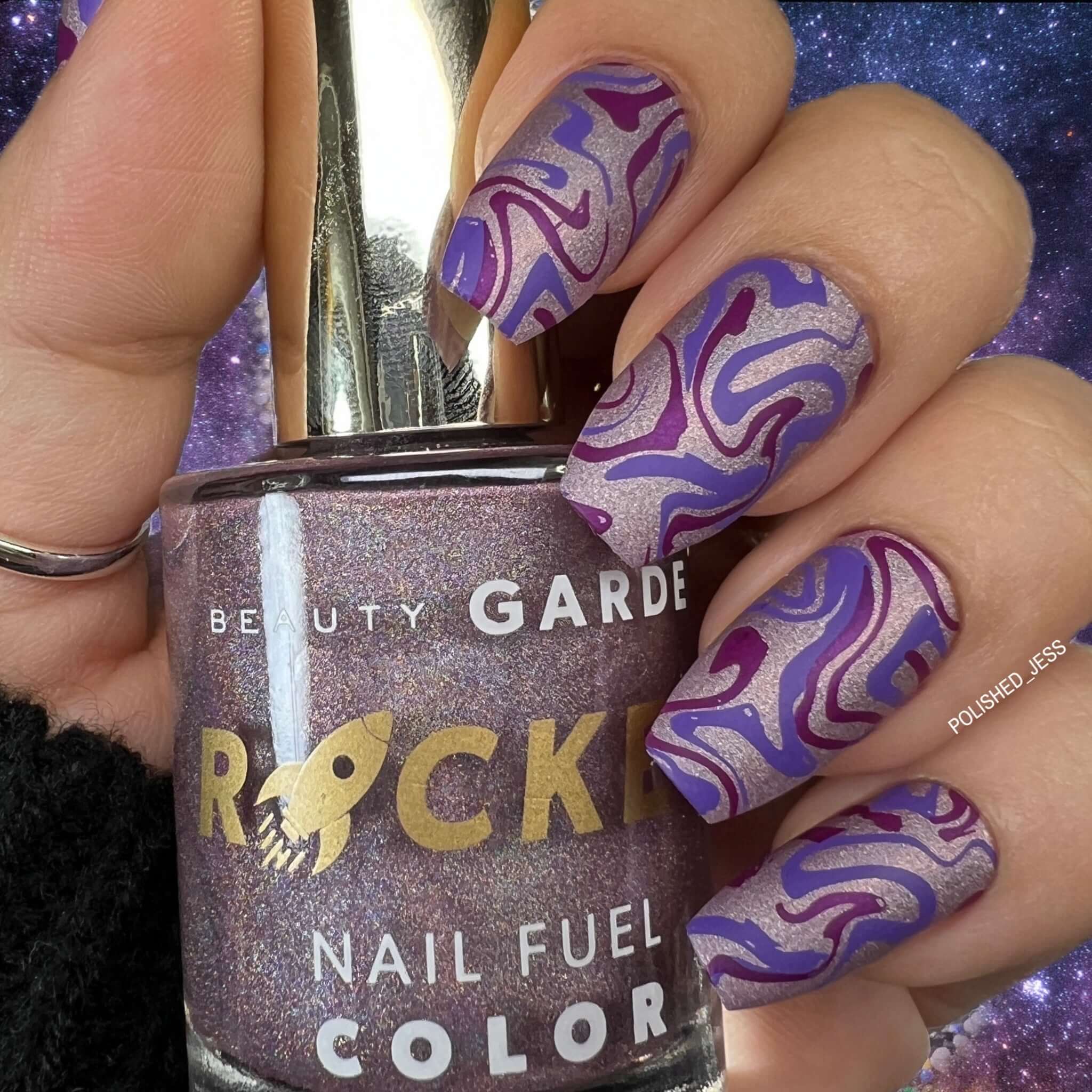 manicured-hand-with-modern-marble-patterns