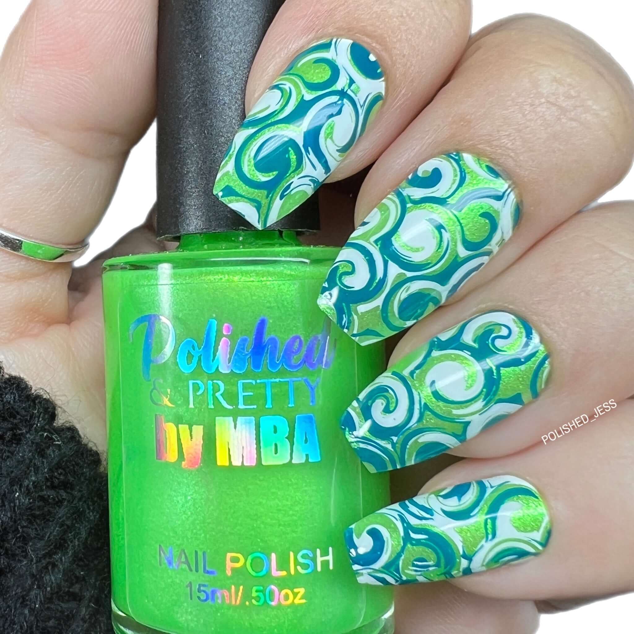 manicured-hand-with-full-coverage-abstract-swirl-print-nail-art-designs