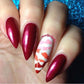 Bold_manicure_with_nail_art_designs_of_lip_stick_print