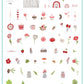 layered-nail-art-stamping-plate-inspo-card-with-colourful-designs-of-trees-hearts-flowers-toodstools-and-words-for-nail-art