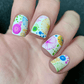bright-manicure-with-abstract-nail-art-designs-of-swirls-blobs-spines