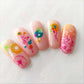 beautiful-set-of-nail-tips-with-stunning-nail-art-designs-of-swirls-twirls-and-abstract-shapes