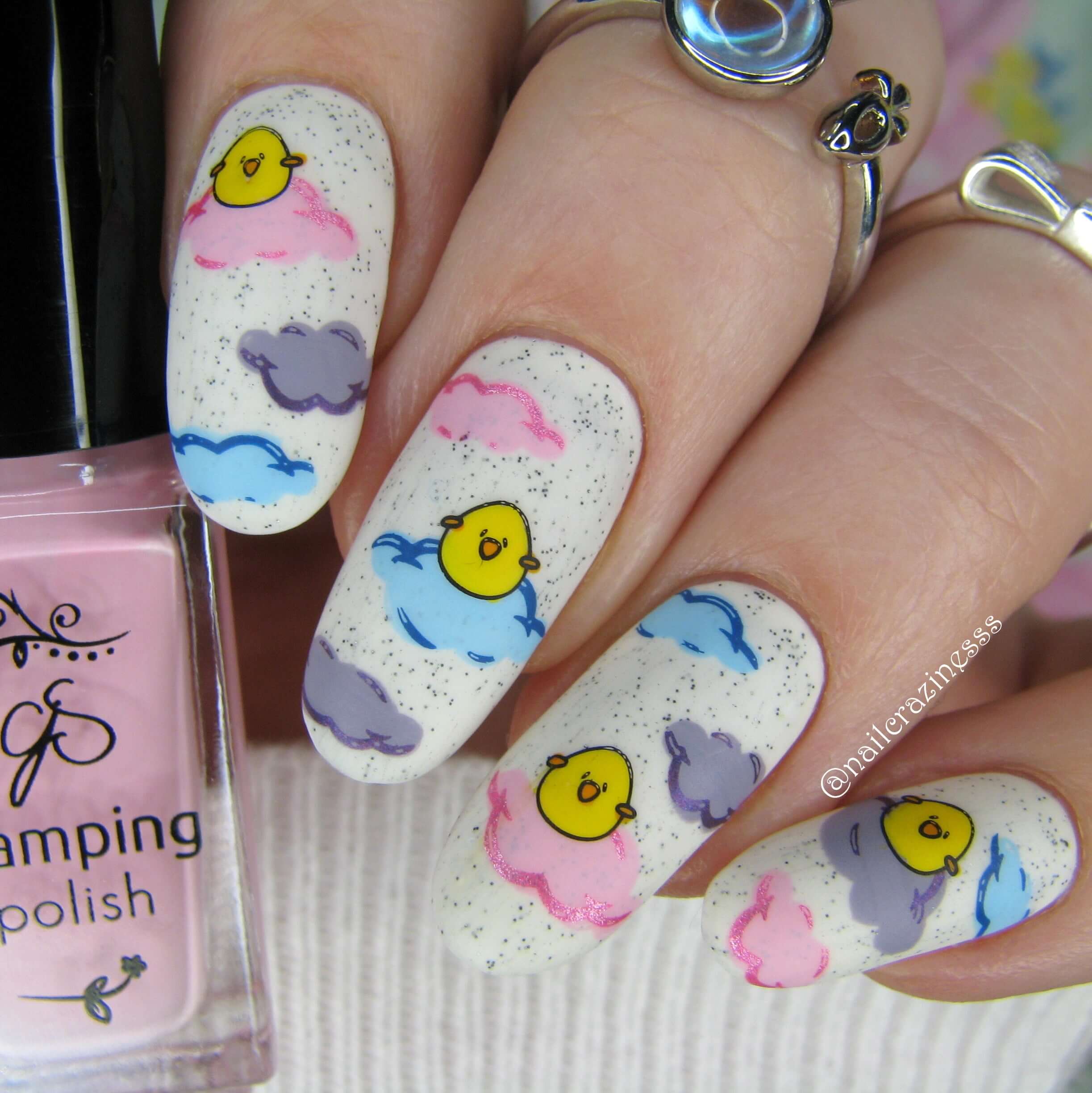 manicure-with-cute-nail-art-designs-of-cartoons-chicks-sitting-on-clouds