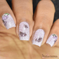 stunning-manicure-with-nail-art-designs-of-swirls-and-butterflies