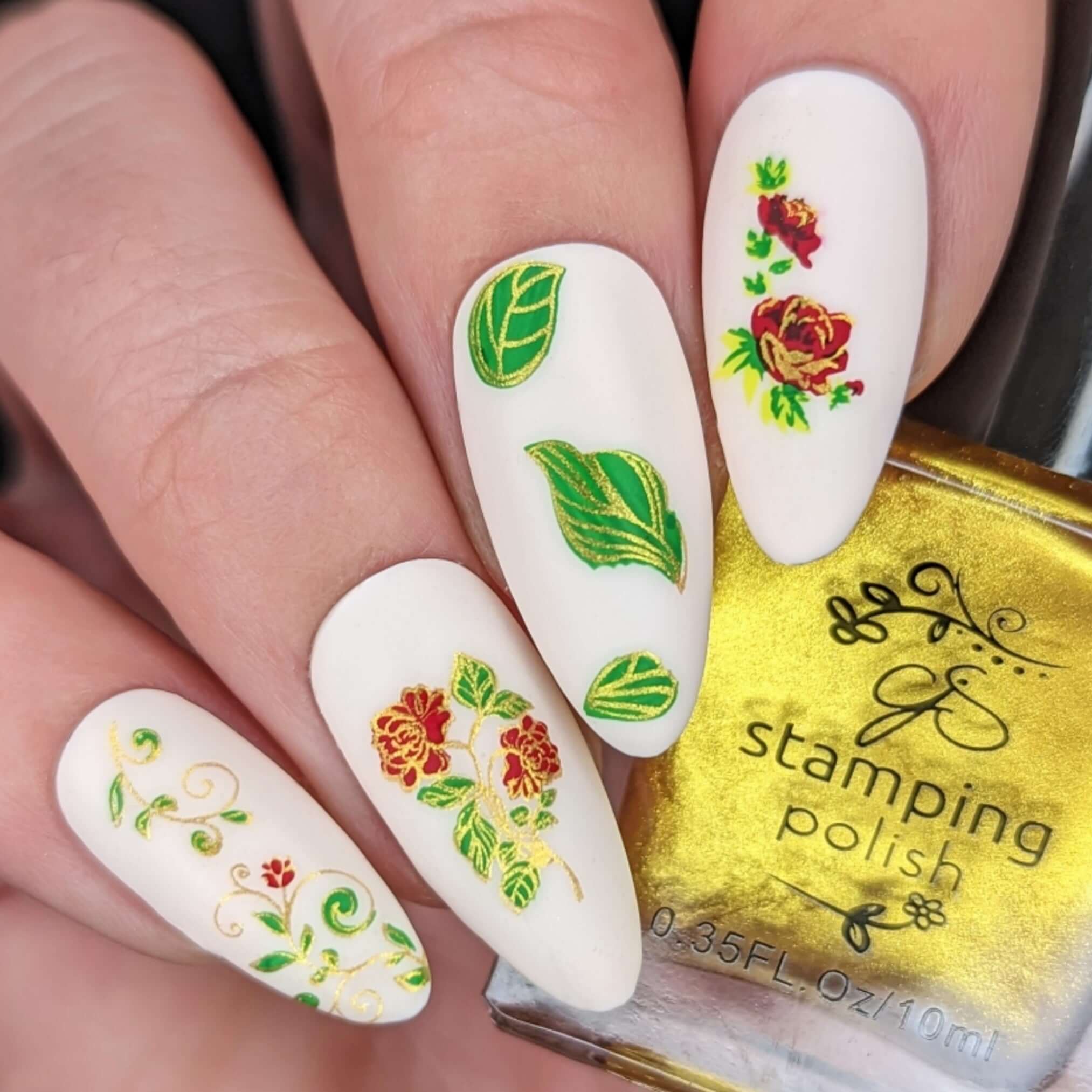 stunning-manciure-showing-nail-art-designs-of-rose-flowers-and-leaves