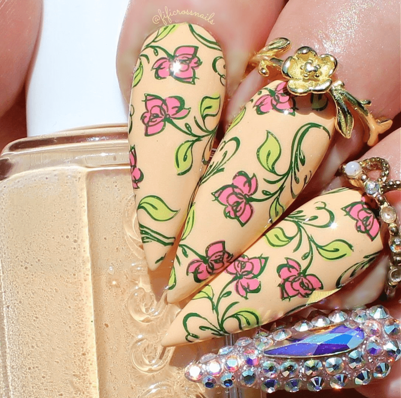 beautiful-manicure-with-layered-nail-art-designs-of-floral-swirls-and-leaves
