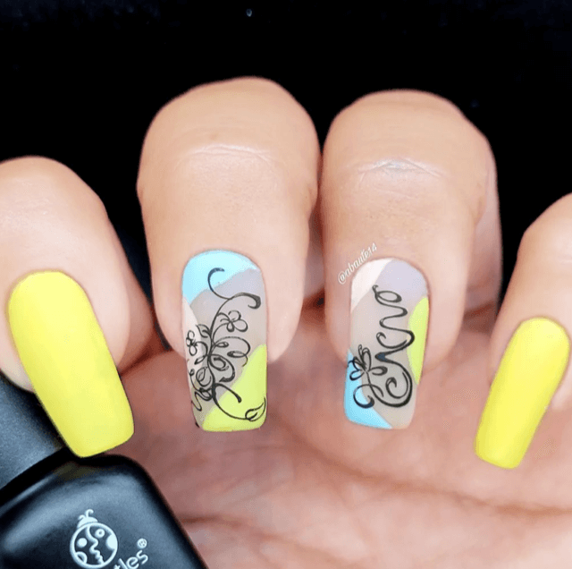 stunning-manicure-with-modern-abstract-nail-art-designs-of-swirls