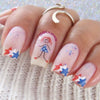 Manicure-showing-nail-art-designs-of-red-white-and-blue-stars-with-a-cartoon-girl