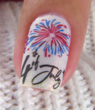 a-single-manicured-nail-showing-nail-art-stamping-designs-of-firworks-and-words-fourth-of-july