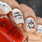 Shimmery-manicure-in-red-white-and-blue-showing-a-patriotic-gnome-stars-fireworks-and-happy-independance-day
