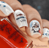 Shimmery-manicure-in-red-white-and-blue-showing-a-patriotic-gnome-stars-fireworks-and-happy-independance-day