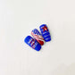 Bright-manicure-in-red-white-and-blue-showing-the-stars-and-stripes-flag-and-words-united-states-of-america
