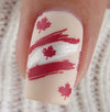 single-manicured-nail-tip-showing-nail-art-design-of-canadian-flag