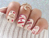 beautiful-manicure-for-canada-day-showing-nail-art-designs-of-a-beaver-and-maple-leaves
