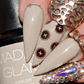 manicure-showing-nail-art-design-of-buttons