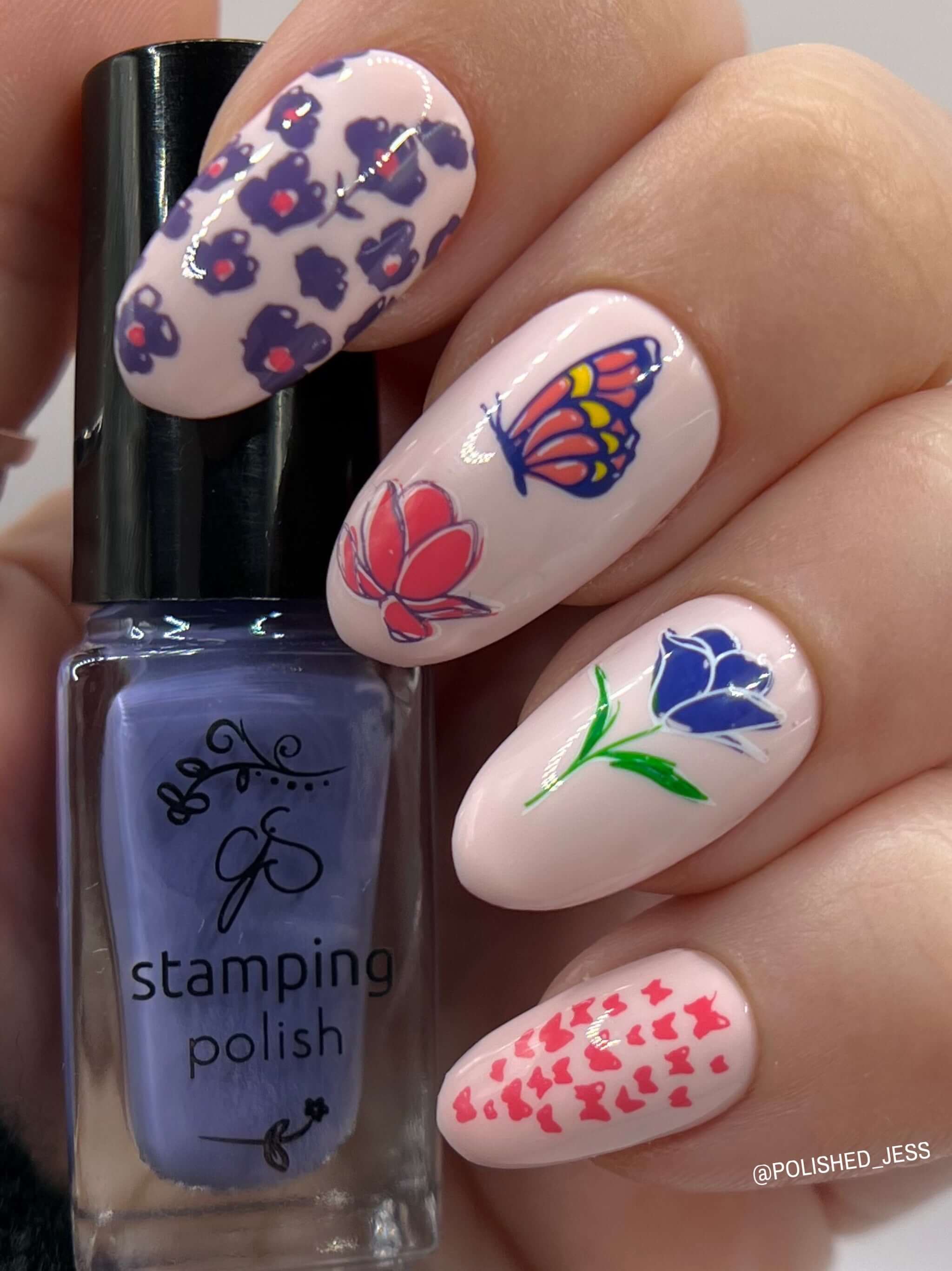 bright-manicure-showing-nail-art-designs-of-butterlies-and-flowers