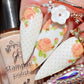 stunning-manicure-showing-layered-nail-art-designs-of-roses-with-dot-pattern