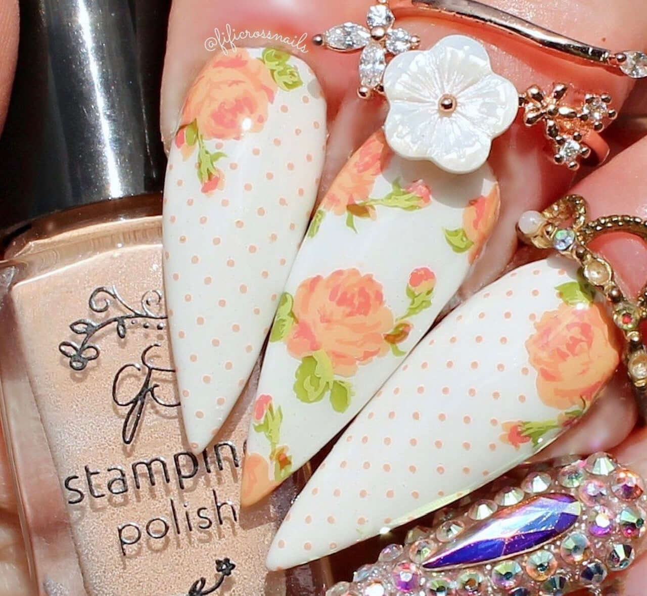 stunning-manicure-showing-layered-nail-art-designs-of-roses-with-dot-pattern