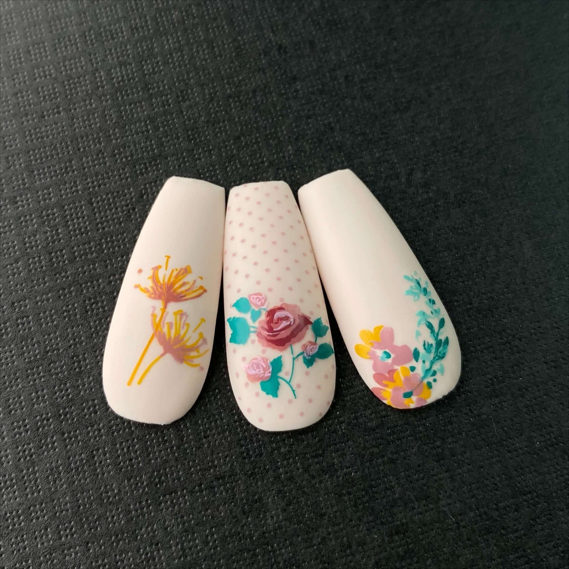 set-of-three-nail-tip-with-layered-nail-art-designs-of-flowers