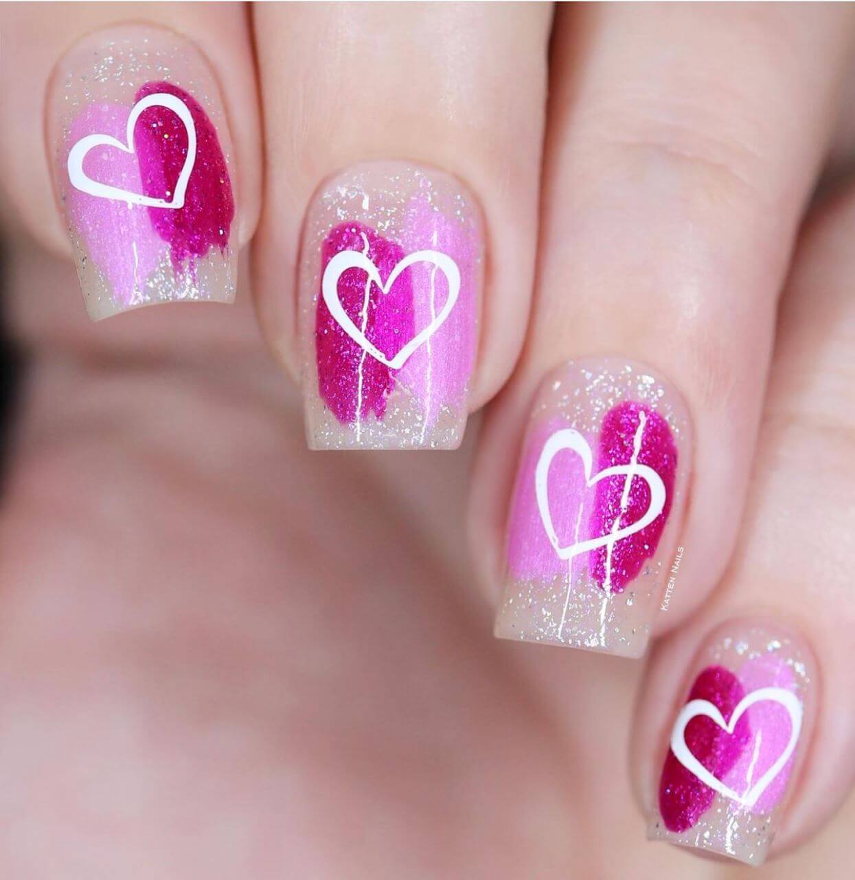 stunning-shimmery-manicure-with-nail-art-designs-of-hearts