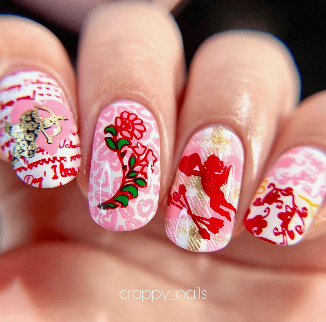 bold-manicure-with-valentines-nail-art-designs-of-cherubs-swirls-and-script