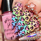 manicured-hand-with-full-coverage-nail-art-designsof-heart-animal-print