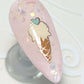 single-nail-tip-with-layered-nail-art-design-of-an-ice-cream-cone