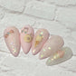 set-of-five-nail-tips-with-layered-nail-art-designs-of-a-cupcake-ice-cream-cone-and-music-notes