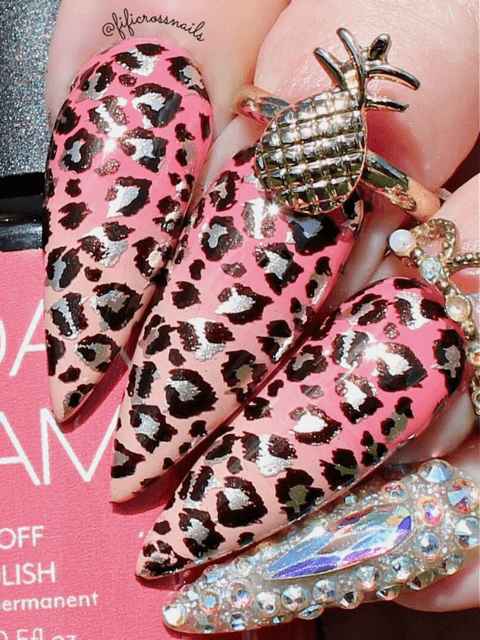 manicured-hand-with-full-coverage-animal-print-nail-art-designs