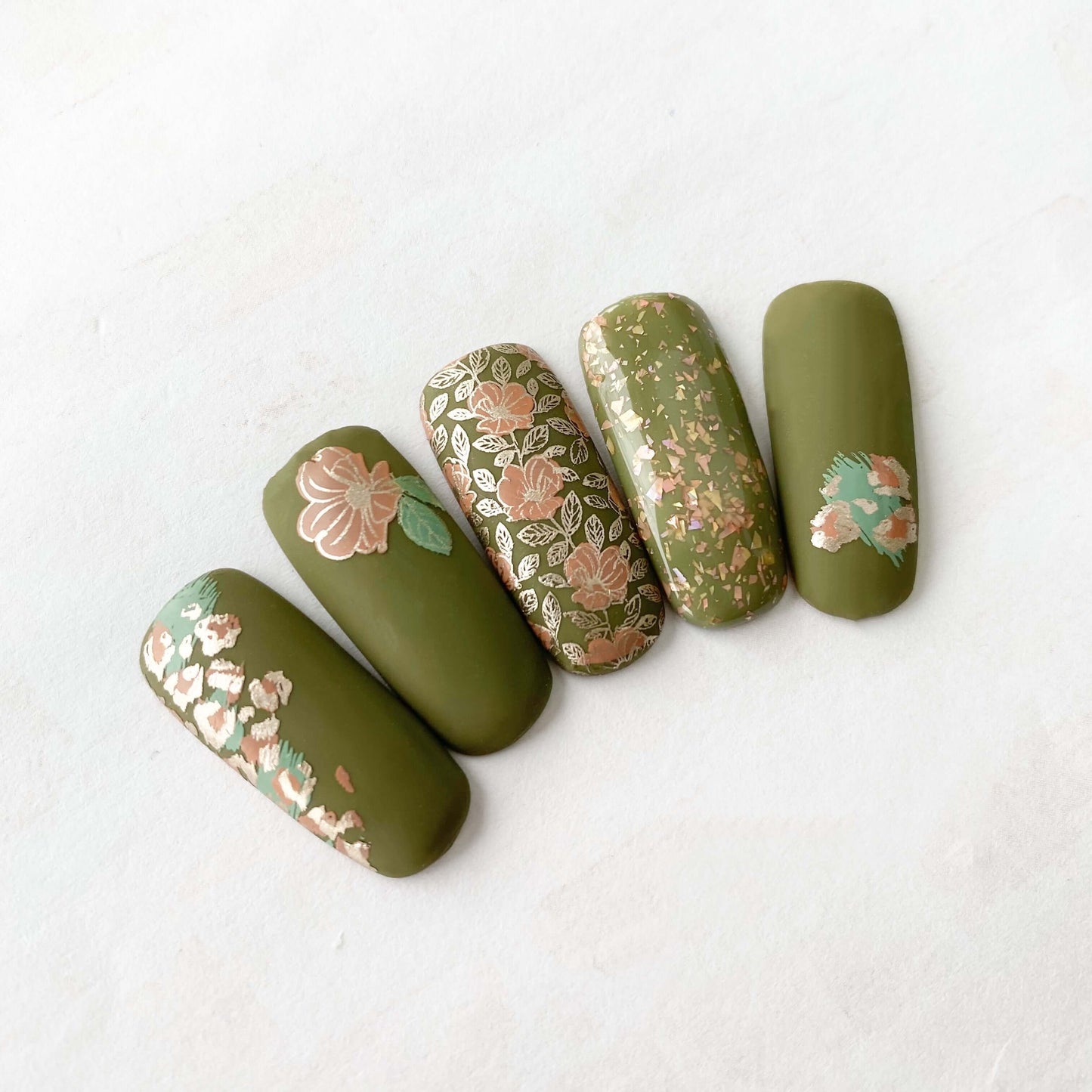 set-of-nail-tips-with-stunning-floral-nail-art-designs