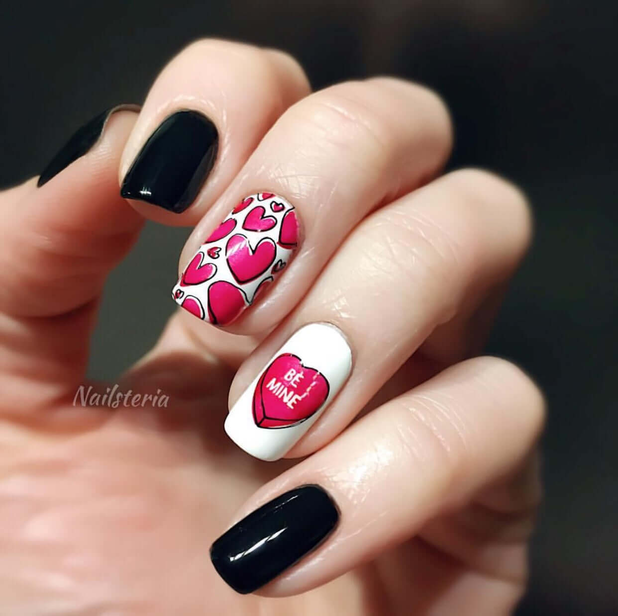 bold-manicure-with-nail-art-designs-o-hearts-and-a-love-heart-candy-saying-be-mine