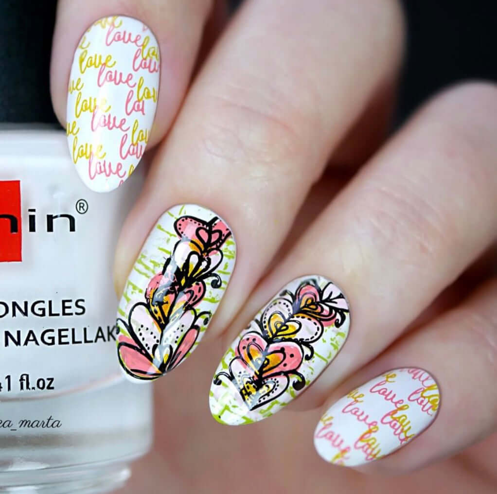 gorgeous-manicure-with-layered-nail-art-designs-of-stacked-hearts-and-words-love