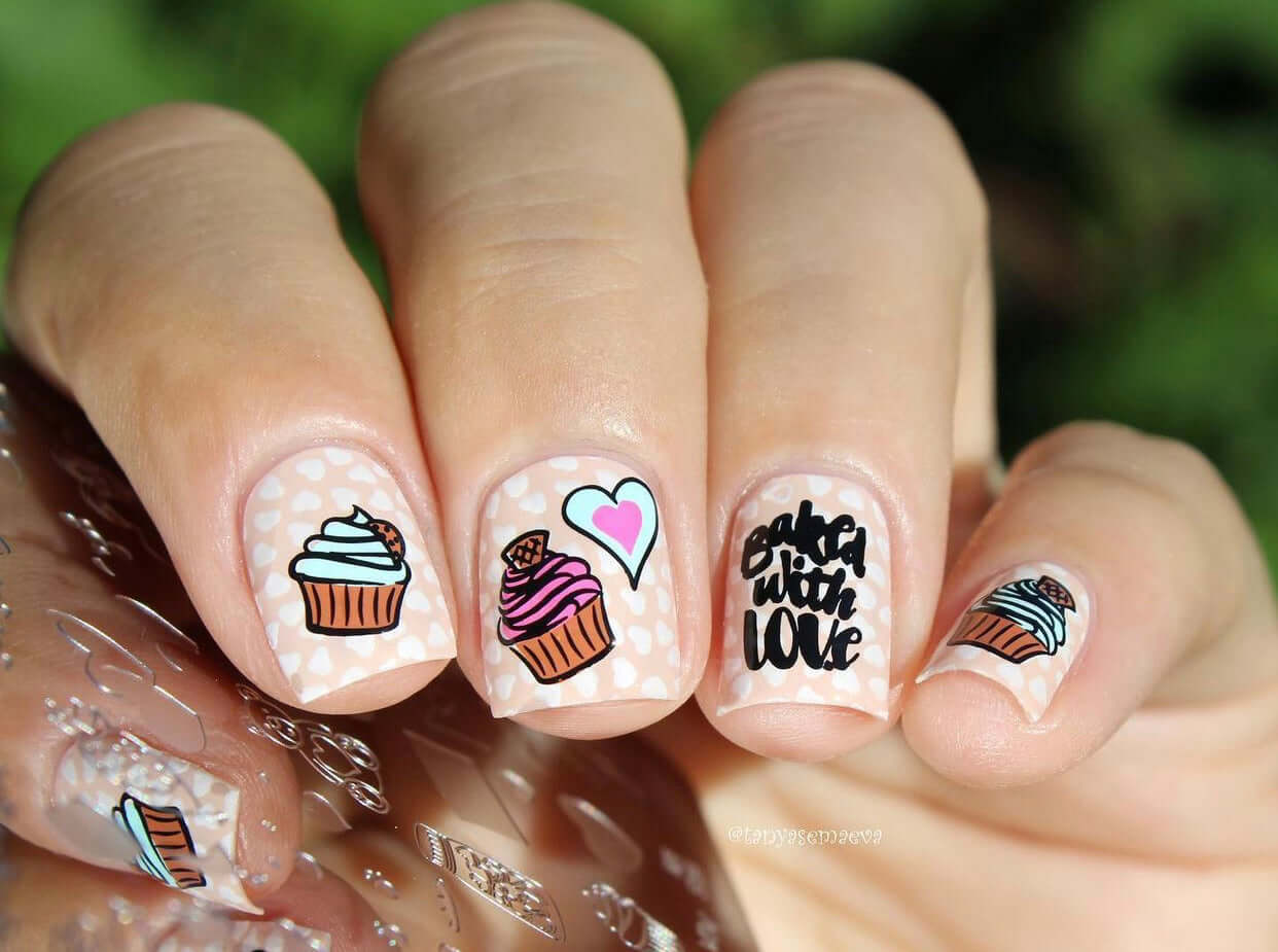 stunning-manicure-with-nail-art-designs-of-cupcakes-and-the-words-baked-with-love