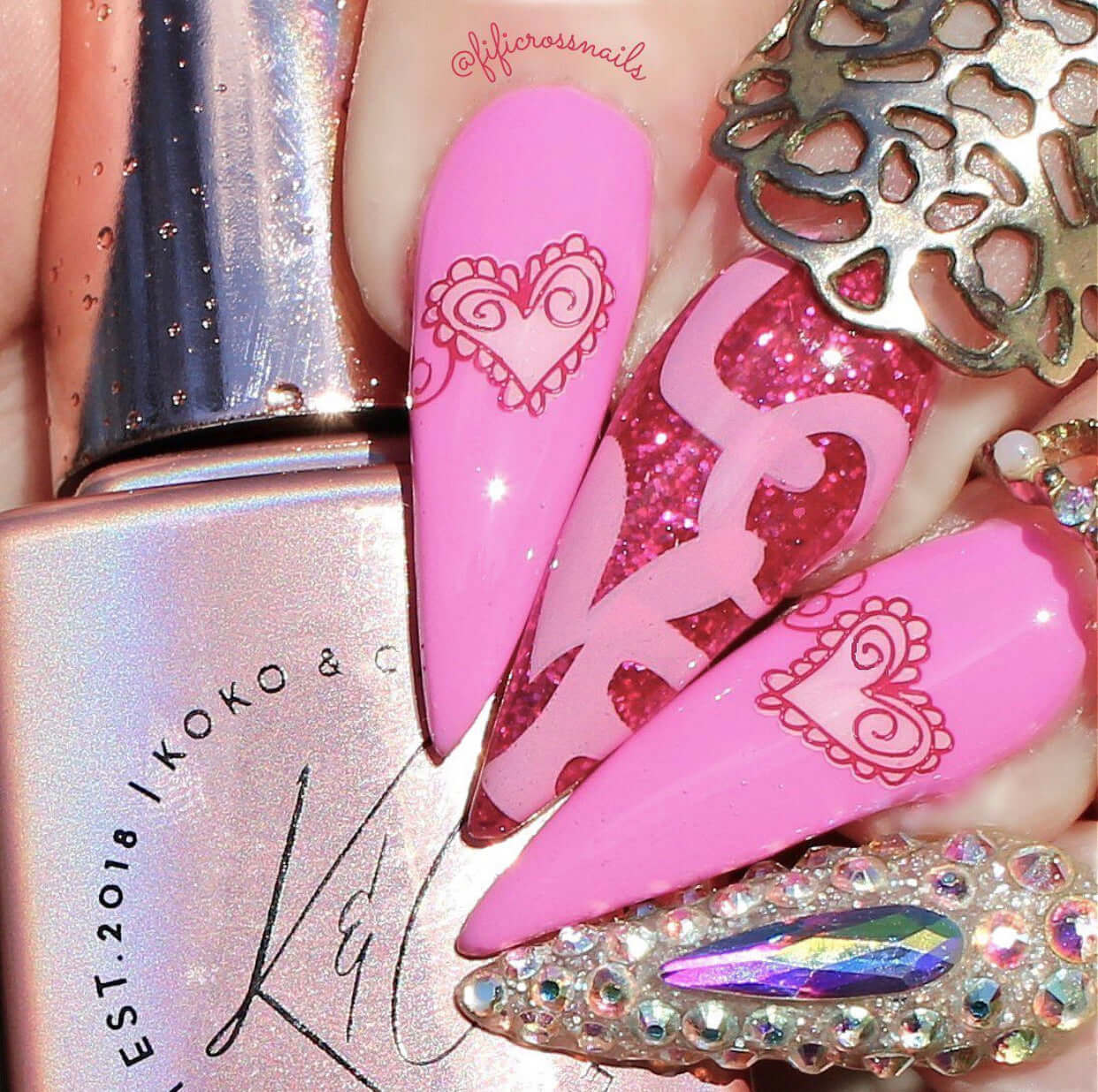 bright-manicure-with-valentines-nail-art-designs-of-hearts-and-letters-L-O-V-E