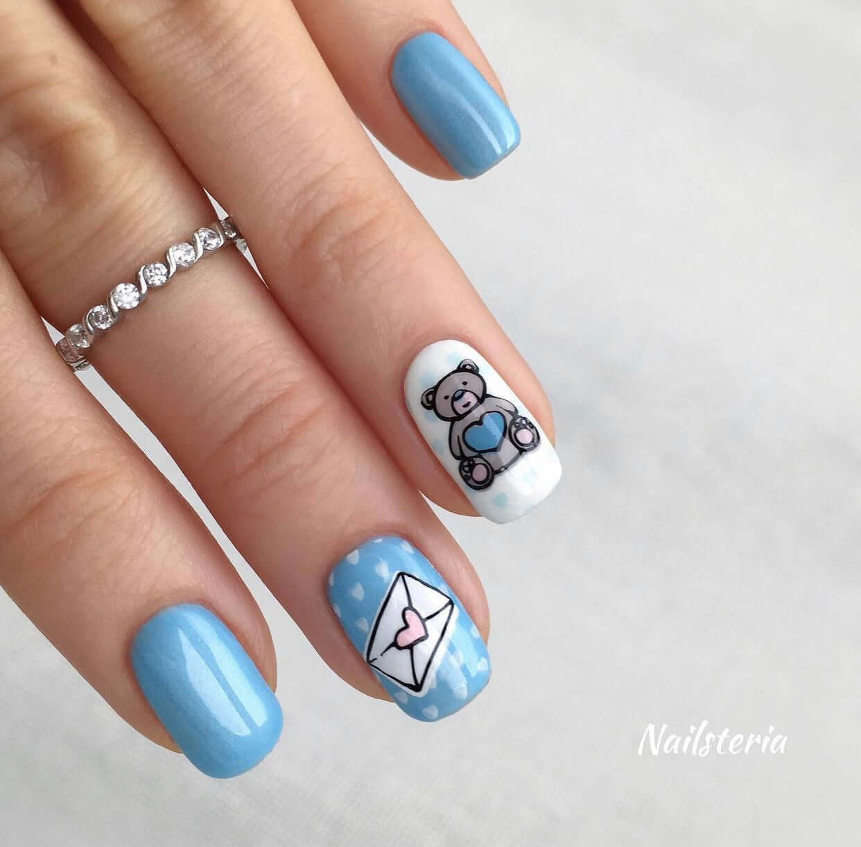 gorgeous-manicure-with-nail-art-designs-of-a-love-letter-and-teddy-bear