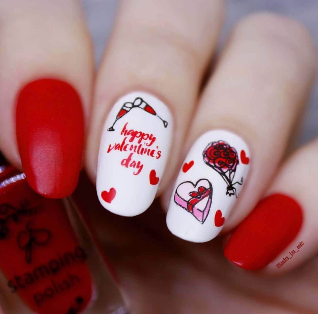 gorgeous-manicure-with-nail-art-designs-of-chocolate-roses-and-the-words-happy-valentines-day