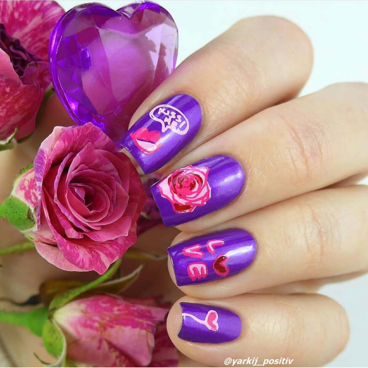 bright-manicure-with-valentine's-themed-nail-art-of-a-rose-a-heart-balloon-and-words-love