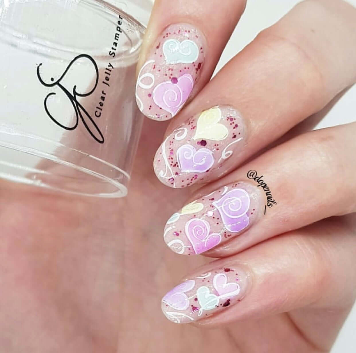 gorgeous-manicure-with-nail-art-designs-of-hearts-and-swirls