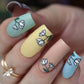 manicured-hand-with-nail-art-stamping-designs-of-spring-flowers