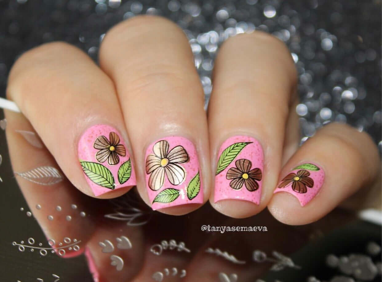 bright-manicure-with-nail-art-designs-of-petals-flower-heads-and-leaves